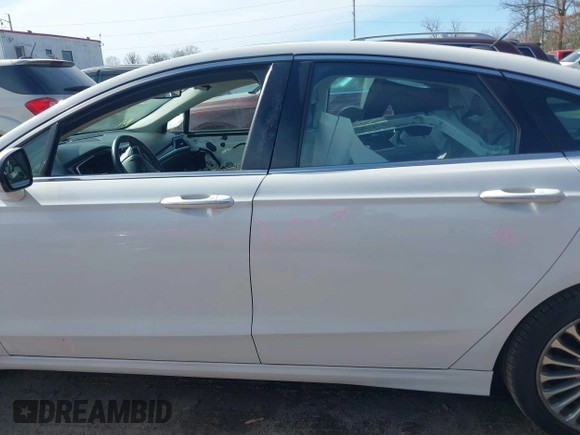 2015 Ford Fusion Titanium with VIN 3FA6P0K90FR207410, listed as a IAAI auction lot 41742534 with 171,008 mi miles. Bid and sale history available at carsss.com. Image 14.