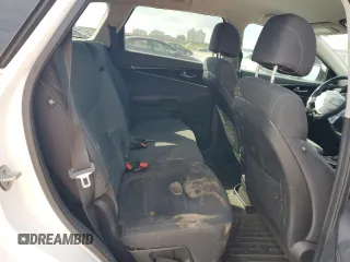2017 Kia Sorento LX z VIN 5XYPG4A34HG220340, wystawiony jako Copart lot #57467775 z przebiegiem 144 612 mil mil oraz Szkoda całkowita • Salvage title. Historia ofert i sprzedaży dostępna na DreamBid. Obrazek 11.