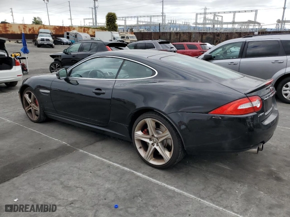 2013 Jaguar XK with VIN SAJWA4DC6DMB50779, listed as a Copart auction lot 50687705 with 106,826 mi miles and Clean Title. Bid and sale history available at carsss.com. Image 2.