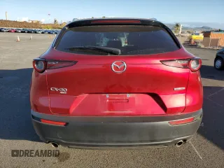 2023 Mazda CX-30 S Carbon Edition z VIN 3MVDMBCM5PM566659, wystawiony jako Copart lot #43979955 z przebiegiem 19 582 mil mil oraz Szkoda całkowita • Salvage title. Historia ofert i sprzedaży dostępna na DreamBid. Obrazek 6.