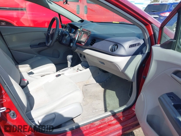 2010 Honda Insight EX with VIN JHMZE2H78AS032088, listed as a IAAI auction lot 41694387 with 145,776 mi miles and . Bid and sale history available at DreamBid. Image 5.