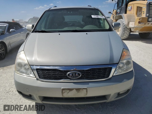 2012 Kia Sedona EX with VIN KNDMH4C72C6459882, listed as a Copart auction lot 77481744 with 136,947 mi miles and Salvage Title. Bid and sale history available at carsss.com. Image 5.