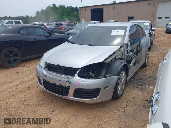 2010 Volkswagen Jetta Wolfsburg Edition z VIN 3VWRJ7AJ1AM024548, wystawiony jako IAAI lot #42281115 z przebiegiem 163 666 mil mil oraz . Historia ofert i sprzedaży dostępna na DreamBid. Obrazek 2.