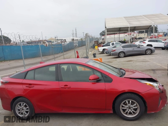 2016 Toyota Prius Two z VIN JTDKBRFU4G3531941, wystawiony jako IAAI lot #42023633 z przebiegiem 249 098 mil mil oraz . Historia ofert i sprzedaży dostępna na DreamBid. Obrazek 13.