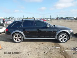 2014 Audi allroad Premium Plus with VIN WA1UFAFLXEA020789, listed as a IAAI auction lot 41959838 with 133,520 mi miles. Bid and sale history available at carsss.com. Image 14.