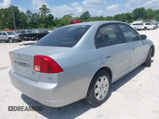 2002 Honda Civic EX with VIN 2HGES26752H548303, listed as a IAAI auction lot 42184753 with 138,873 mi miles and . Bid and sale history available at DreamBid. Image 4.