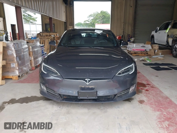 2018 Tesla Model S 75D with VIN 5YJSA1E28JF298208, listed as a IAAI auction lot 42438793 with Not provided miles and . Bid and sale history available at DreamBid. Image 12.