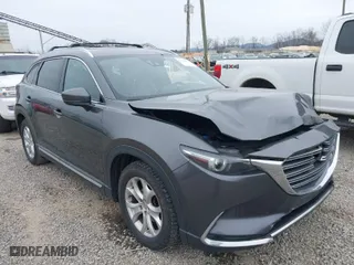 2016 Mazda CX-9 Grand Touring with VIN JM3TCBDY1G0103560, listed as a IAAI auction lot 41344813 with 123,588 mi miles. Bid and sale history available at carsss.com. Image 1.
