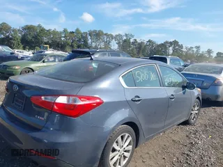 2014 Kia Forte EX with VIN KNAFX4A80E5099170, listed as a IAAI auction lot 40520284 with 172,599 mi miles. Bid and sale history available at carsss.com. Image 4.