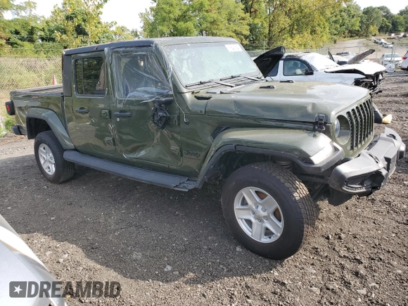 2022 Jeep Gladiator Willys with VIN 1C6JJTAMXNL135925, listed as a Copart auction lot 71642054 with 17,964 mi miles and Salvage title. Bid and sale history available at DreamBid. Image 4.