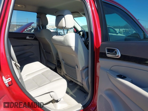 2012 Jeep Grand Cherokee Laredo with VIN 1C4RJFAG7CC297757, listed as a IAAI auction lot 41901645 with 270,731 mi miles. Bid and sale history available at carsss.com. Image 8.