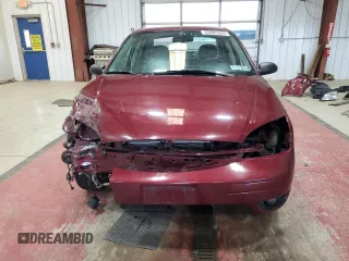 2006 Ford Focus S z VIN 1FAFP34N76W153239, wystawiony jako Copart lot #53085555 z przebiegiem 118 259 mil mil oraz Szkody całkowita. Historia ofert i sprzedaży dostępna na DreamBid. Obrazek 5.