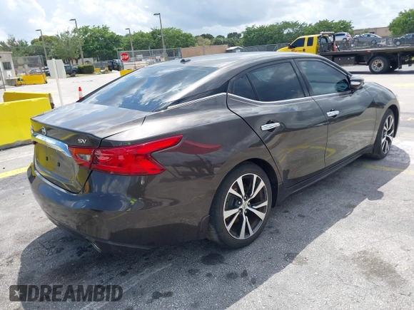 2016 Nissan Maxima SR with VIN 1N4AA6AP9GC405420, listed as a IAAI auction lot 41933739 with 59,680 mi miles and . Bid and sale history available at DreamBid. Image 4.
