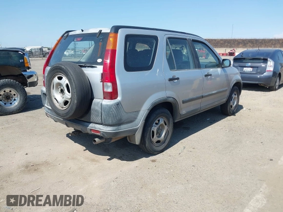 2003 Honda CR-V LX z VIN JHLRD68453C004928, wystawiony jako IAAI lot #42452176 z przebiegiem 258 092 mil mil oraz . Historia ofert i sprzedaży dostępna na DreamBid. Obrazek 4.