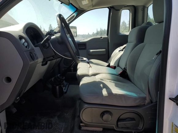 2007 Ford F-150 XL with VIN 1FTRF12217NA72946, listed as a Copart auction lot 65255485 with 120,123 mi miles and Salvage title. Bid and sale history available at DreamBid. Image 7.