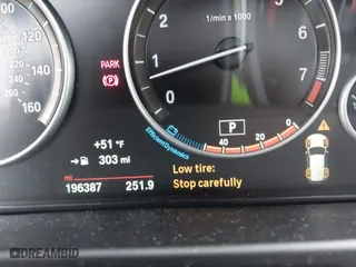 2015 BMW X5 xDrive35i with VIN 5UXKR0C54F0P00889, listed as a IAAI auction lot 42023099 with 196,387 mi miles. Bid and sale history available at carsss.com. Image 7.