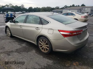2013 Toyota Avalon XLE with VIN 4T1BK1EB8DU042204, listed as a Copart auction lot 61438205 with 246,420 mi miles and Clean title. Bid and sale history available at DreamBid. Image 2.