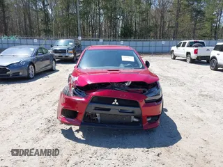 2008 Mitsubishi Lancer Evolution GSR with VIN JA3AW86V38U050561, listed as a IAAI auction lot 41879629 with 104,905 mi miles. Bid and sale history available at carsss.com. Image 12.