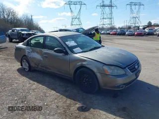 2002 Nissan Altima S with VIN 1N4AL11D92C256180, listed as a IAAI auction lot 41880101 with 112,228 mi miles. Bid and sale history available at carsss.com. Image 1.
