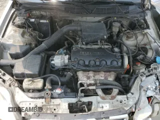 1997 Honda Civic LX z VIN 2HGEJ6677VH573069, wystawiony jako Copart lot #59739065 z przebiegiem 287 987 mil mil oraz Szkoda całkowita • Salvage title. Historia ofert i sprzedaży dostępna na DreamBid. Obrazek 11.