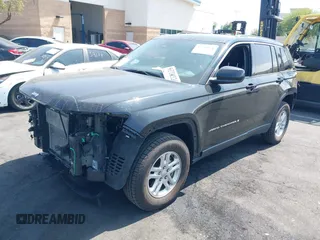 2022 Jeep Grand Cherokee Laredo with VIN 1C4RJHAG2N8595697, listed as a IAAI auction lot 42349561 with 39,073 mi miles and . Bid and sale history available at DreamBid. Image 18.