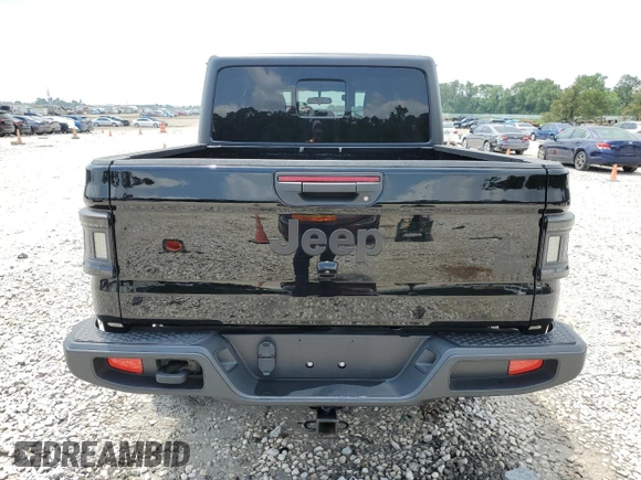 2023 Jeep Gladiator Sport S with VIN 1C6HJTAG9PL525183, listed as a Copart auction lot 54556735 with 13,805 mi miles and Salvage title. Bid and sale history available at DreamBid. Image 6.