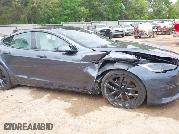 2023 Tesla Model S with VIN 5YJSA1E53PF511231, listed as a IAAI auction lot 41924626 with Not provided miles and . Bid and sale history available at DreamBid. Image 6.