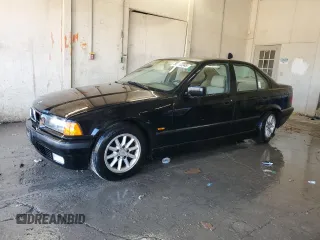 1997 BMW 3 Series 328iA with VIN WBACD432XVAV46101, listed as a Copart auction lot 88912345 with 149,163 mi miles and Salvage Title. Bid and sale history available at carsss.com. Image 1.