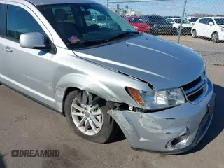 2013 Dodge Journey SXT with VIN 3C4PDDBG4DT506900, listed as a IAAI auction lot 42032379 with 130,911 mi miles and . Bid and sale history available at DreamBid. Image 6.