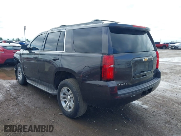 2015 Chevrolet Tahoe LT with VIN 1GNSCBKC2FR632173, listed as a IAAI auction lot 42135105 with 150,033 mi miles and . Bid and sale history available at DreamBid. Image 3.