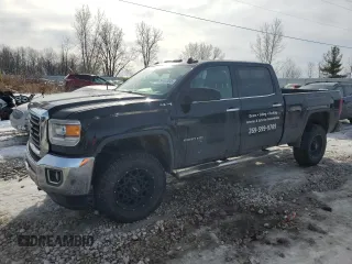 2015 GMC Sierra 2500HD SLT with VIN 1GT12ZE86FF127620, listed as a Copart auction lot 42472045 with 198,525 mi miles and Clean title. Bid and sale history available at DreamBid. Image 1.