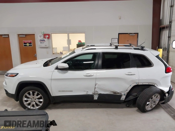 2014 Jeep Cherokee Limited with VIN 1C4PJMDS1EW235980, listed as a IAAI auction lot 41994044 with 128,292 mi miles and . Bid and sale history available at DreamBid. Image 15.