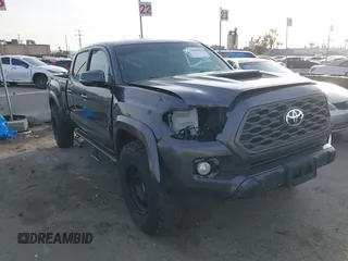 2021 Toyota Tacoma 4WD SR5 with VIN 3TMDZ5BN2MM108586, listed as a IAAI auction lot 41604953 with 65,422 mi miles. Bid and sale history available at carsss.com. Image 1.