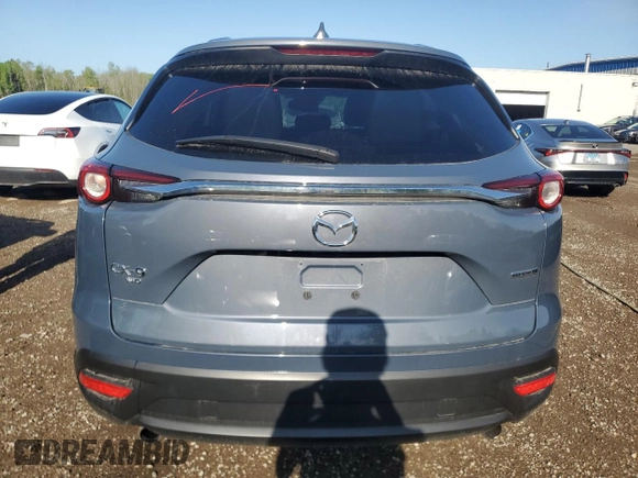 2023 Mazda CX-9 Touring z VIN JM3TCBCYXP0650893, wystawiony jako Copart lot #56875635 z przebiegiem 30 055 mil mil oraz Czysty tytuł • Clean title. Historia ofert i sprzedaży dostępna na DreamBid. Obrazek 6.