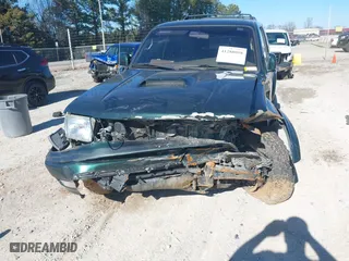 2001 Toyota 4Runner SR5 with VIN JT3HN86R310335526, listed as a IAAI auction lot 41288058 with 202,219 mi miles. Bid and sale history available at carsss.com. Image 6.