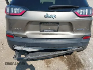 2019 Jeep Cherokee Latitude Plus with VIN 1C4PJMLN8KD148533, listed as a IAAI auction lot 42480637 with 63,473 mi miles and . Bid and sale history available at DreamBid. Image 6.
