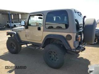 2004 Jeep Wrangler Rubicon with VIN 1J4FA69S64P751349, listed as a Copart auction lot 69642624 with 160,589 mi miles and Salvage Title. Bid and sale history available at carsss.com. Image 2.