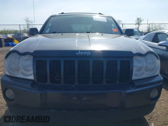 2007 Jeep Grand Cherokee Laredo with VIN 1J8GR48K77C582875, listed as a IAAI auction lot 42061653 with 259,767 mi miles. Bid and sale history available at carsss.com. Image 12.
