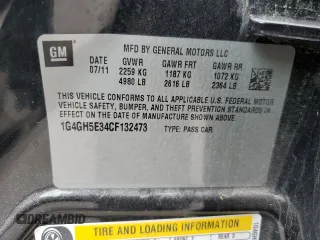 2012 Buick LaCrosse Premium 3 z VIN 1G4GH5E34CF132473, wystawiony jako Copart lot #48983995 z przebiegiem 152 276 mil mil oraz Szkoda całkowita • Salvage title. Historia ofert i sprzedaży dostępna na DreamBid. Obrazek 13.