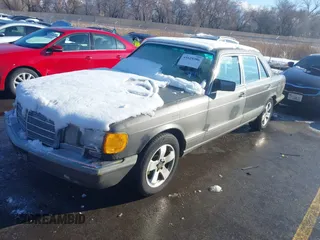 1986 Mercedes-Benz 420 420SEL with VIN WDBCA35D4GA250724, listed as a IAAI auction lot 41629306 with 228,711 mi miles. Bid and sale history available at carsss.com. Image 2.