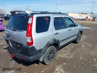2005 Honda CR-V EX with VIN SHSRD778X5U319391, listed as a IAAI auction lot 41836111 with 150,289 mi miles. Bid and sale history available at carsss.com. Image 4.