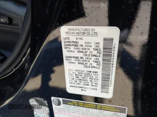 2005 Infiniti FX35 with VIN JNRAS08W95X215995, listed as a IAAI auction lot 42085118 with 295,901 mi miles. Bid and sale history available at carsss.com. Image 9.