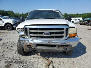 2000 Ford F-250 XL with VIN 1FTNX21F3YEB32295, listed as a Copart auction lot 60867745 with 329,194 mi miles and Salvage title. Bid and sale history available at DreamBid. Image 5.