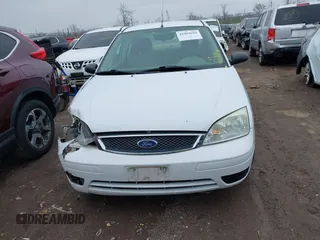 2007 Ford Focus S z VIN 1FAHP34N07W260725, wystawiony jako IAAI lot #42004694 z przebiegiem 84 923 mil mil oraz . Historia ofert i sprzedaży dostępna na DreamBid. Obrazek 12.
