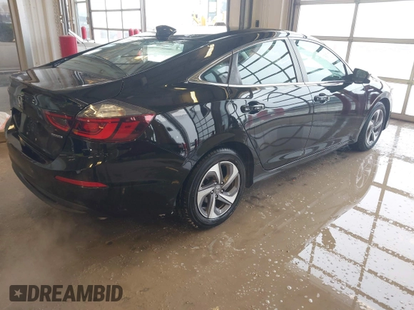 2020 Honda Insight EX with VIN 19XZE4F58LE008670, listed as a IAAI auction lot 41590818 with 80,730 mi miles and . Bid and sale history available at carsss.com. Image 4.