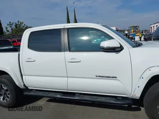 2017 Toyota Tacoma SR5 with VIN 3TMAZ5CN9HM031576, listed as a IAAI auction lot 41457373 with 166,219 mi miles and . Bid and sale history available at DreamBid. Image 14.