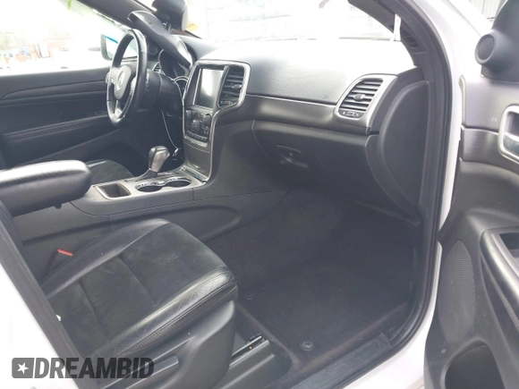 2017 Jeep Grand Cherokee Laredo with VIN 1C4RJFAG7HC700546, listed as a IAAI auction lot 40961293 with 83,702 mi miles and . Bid and sale history available at DreamBid. Image 5.