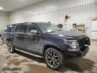 2017 Chevrolet Suburban Premier with VIN 1GNSKJKC8HR199992, listed as a Copart auction lot 45502355 with 219,534 mi miles and Salvage Title. Bid and sale history available at carsss.com. Image 4.