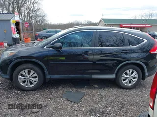 2012 Honda CR-V EX-L with VIN 2HKRM4H72CH607903, listed as a IAAI auction lot 41981042 with 203,584 mi miles. Bid and sale history available at carsss.com. Image 14.