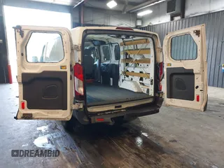 2015 Ford Transit Cargo with VIN 1FTNR1ZM4FKA33796, listed as a IAAI auction lot 40345219 with 95,972 mi miles and . Bid and sale history available at DreamBid. Image 3.